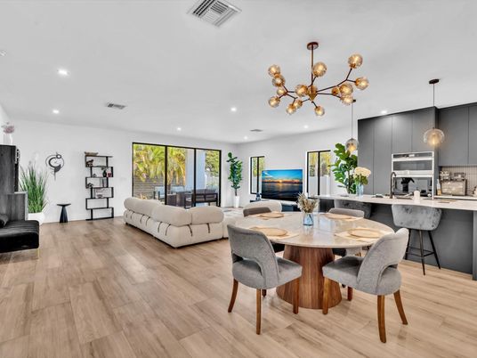 Dining room, Interior, Kitchen, Living room, Pendant Lights, Recessed Lighting, Stainless Steel Appliances, Wood Texture Flooring
