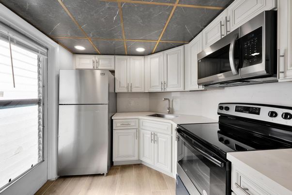 Interior, Kitchen, Recessed Lighting, Stainless Steel Appliances, Wood Texture Flooring