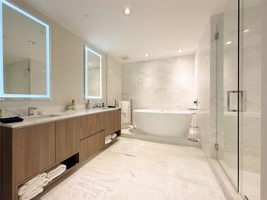 Bathroom, Dual Sink Vanities, Free Standing Baths, Glass Shower, Interior, Marble, Marble Walls, Recessed Lighting