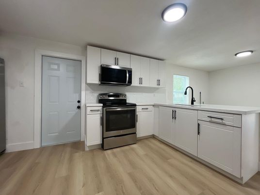 Interior, Kitchen, Recessed Lighting, Stainless Steel Appliances, Wood Texture Flooring