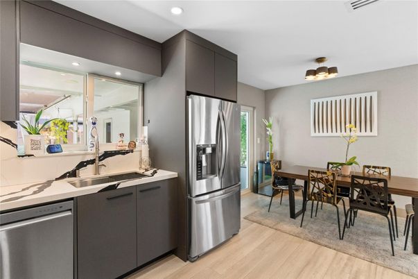 Dining room, Interior, Kitchen, Recessed Lighting, Stainless Steel Appliances, Wood Texture Flooring