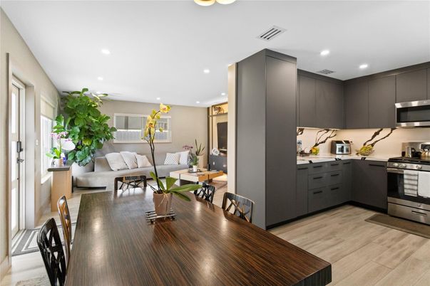 Dining room, Interior, Kitchen, Living room, Recessed Lighting, Stainless Steel Appliances, Wood Texture Flooring