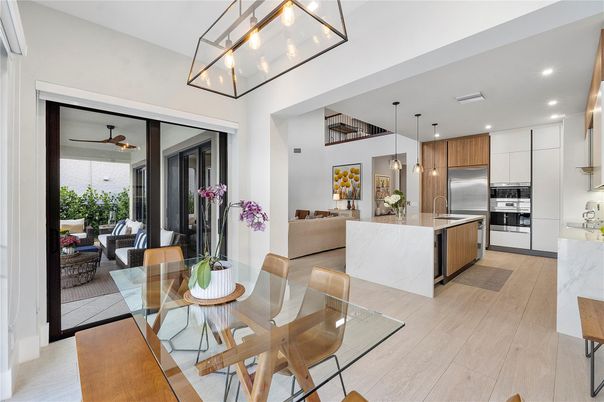 Dining room, Interior, Kitchen, Living room, Pendant Lights, Recessed Lighting, Stainless Steel Appliances, Wood Texture Flooring