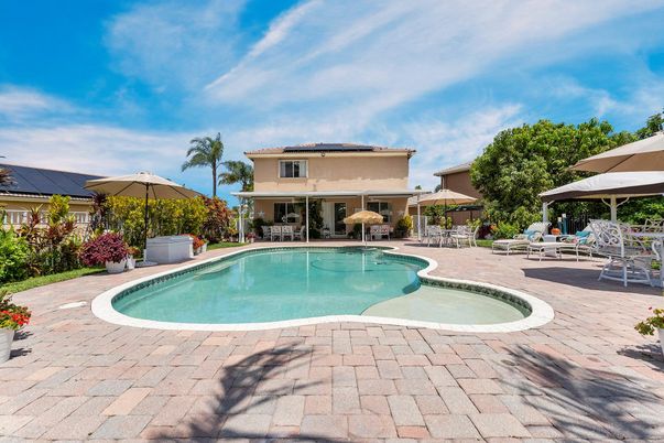 Exterior, Pool, Solar Panels