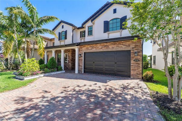 Attached, Exterior, Facade, Brick Facade, Spanish Mediterranean