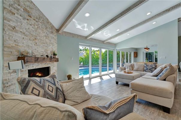 Fireplace, Interior, Living room, Recessed Lighting, Stone Walls, Wooden Beams, Wood Texture Flooring