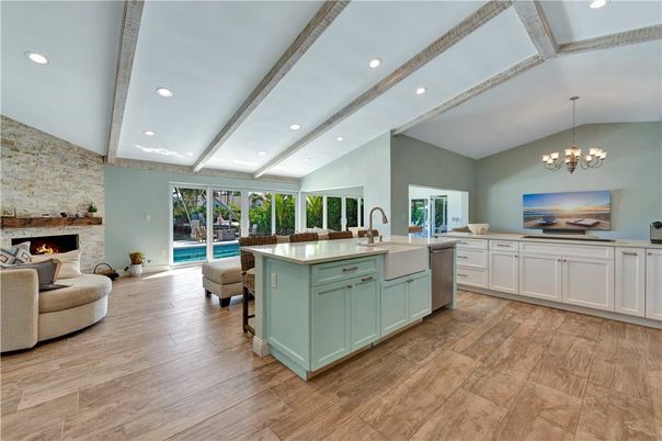 Chandelier, Fireplace, Interior, Kitchen, Living room, Recessed Lighting, Stone Walls, Wooden Beams, Wood Texture Flooring