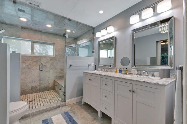 Bathroom, Dual Sink Vanities, Glass Shower, Interior, Marble Walls, Recessed Lighting