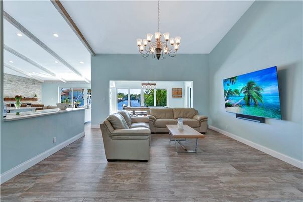 Chandelier, Interior, Living room, Recessed Lighting, Stone Walls, Wooden Beams, Wood Texture Flooring