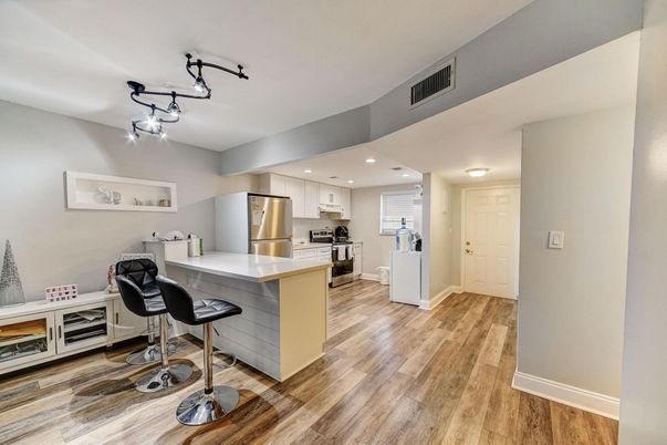 Interior, Kitchen, Recessed Lighting, Stainless Steel Appliances, Wood Texture Flooring