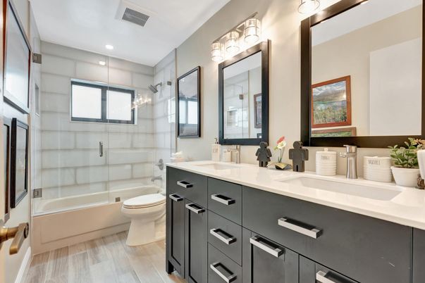 Bathroom, Dual Sink Vanities, Glass Shower, Interior, Recessed Lighting, Wood Texture Flooring