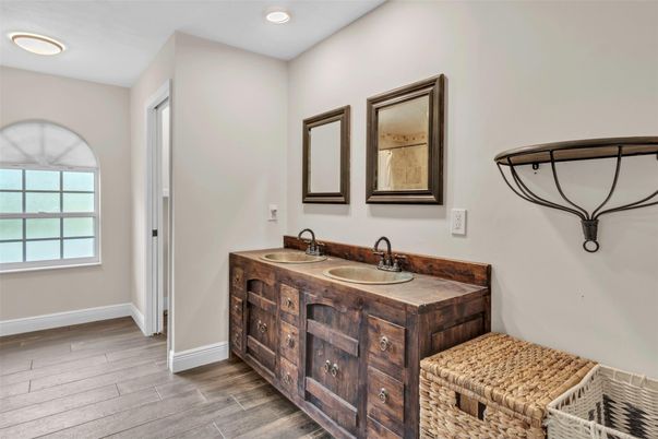 Bathroom, Dual Sink Vanities, Interior, Recessed Lighting, Wood Texture Flooring