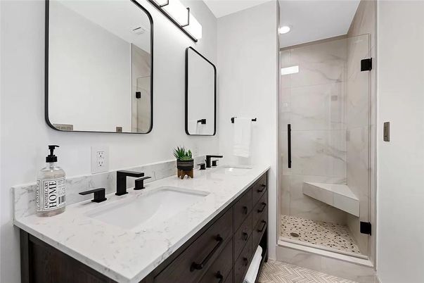 Bathroom, Dual Sink Vanities, Glass Shower, Interior, Marble Walls, Recessed Lighting