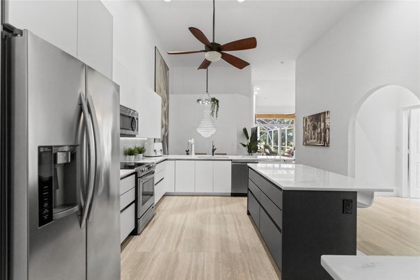 Interior, Kitchen, Pendant Lights, Recessed Lighting, Stainless Steel Appliances, Wood Texture Flooring