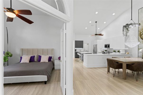 Dining room, Interior, Kitchen, Pendant Lights, Recessed Lighting, Stainless Steel Appliances, Wood Texture Flooring