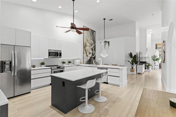 Interior, Kitchen, Pendant Lights, Recessed Lighting, Stainless Steel Appliances, Wood Texture Flooring