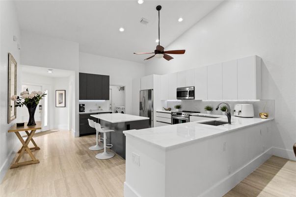Interior, Kitchen, Recessed Lighting, Stainless Steel Appliances, Wood Texture Flooring