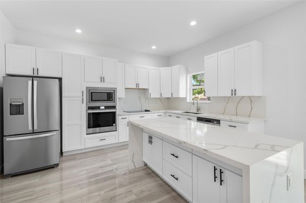 Interior, Kitchen, Recessed Lighting, Stainless Steel Appliances, Wood Texture Flooring