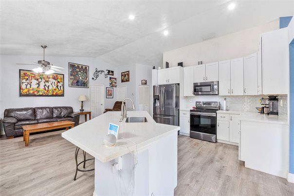 Interior, Kitchen, Living room, Recessed Lighting, Stainless Steel Appliances, Wood Texture Flooring