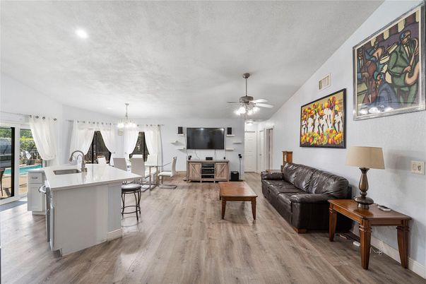 Chandelier, Dining room, Interior, Living room, Recessed Lighting, Wood Texture Flooring