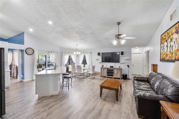 Chandelier, Dining room, Interior, Kitchen, Living room, Recessed Lighting, Wood Texture Flooring