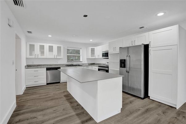 Interior, Kitchen, Recessed Lighting, Stainless Steel Appliances, Wood Texture Flooring