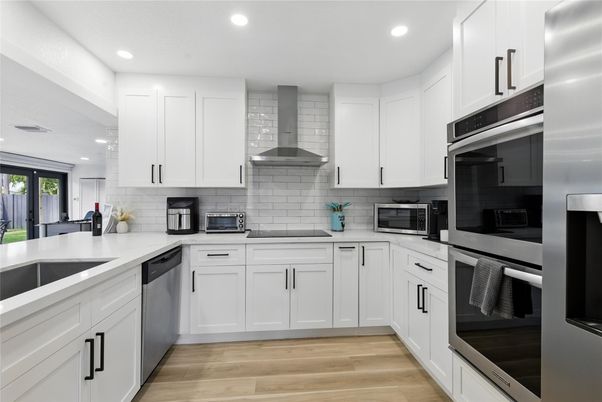 Interior, Kitchen, Recessed Lighting, Stainless Steel Appliances, Wood Texture Flooring