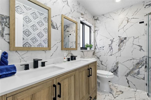 Bathroom, Dual Sink Vanities, Interior, Marble, Marble Walls, Recessed Lighting