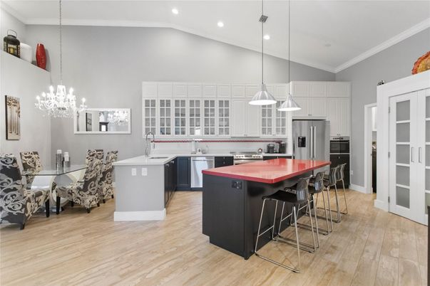 Dining room, Interior, Kitchen, Pendant Lights, Recessed Lighting, Stainless Steel Appliances, Wood Texture Flooring