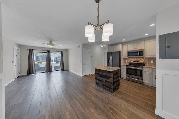 Interior, Kitchen, Pendant Lights, Recessed Lighting, Stainless Steel Appliances, Wood Texture Flooring