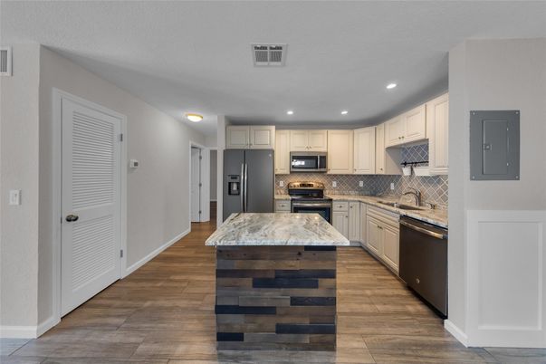 Interior, Kitchen, Recessed Lighting, Stainless Steel Appliances, Wood Texture Flooring