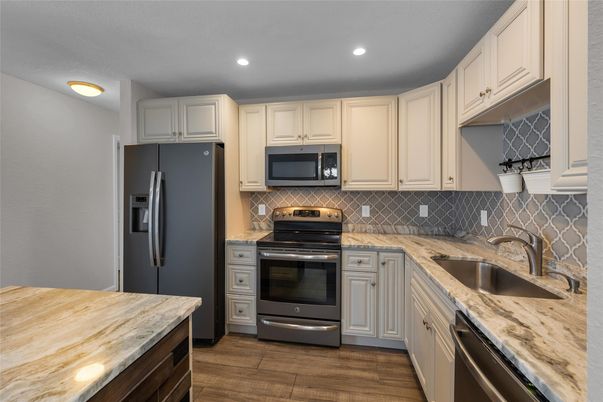 Interior, Kitchen, Recessed Lighting, Stainless Steel Appliances, Wood Texture Flooring