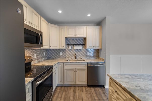 Interior, Kitchen, Recessed Lighting, Stainless Steel Appliances, Wood Texture Flooring