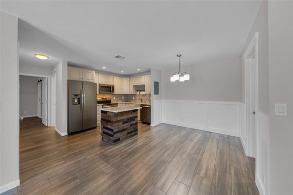 Interior, Kitchen, Pendant Lights, Recessed Lighting, Stainless Steel Appliances, Wood Texture Flooring