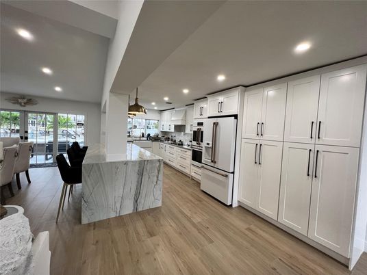 Interior, Kitchen, Pendant Lights, Recessed Lighting, Stainless Steel Appliances, Wood Texture Flooring
