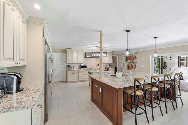 Dining room, Interior, Kitchen, Pendant Lights, Recessed Lighting, Stainless Steel Appliances, Stone Walls
