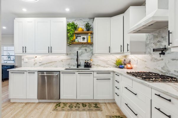 Interior, Kitchen, Marble Walls, Recessed Lighting, Stainless Steel Appliances, Wood Texture Flooring
