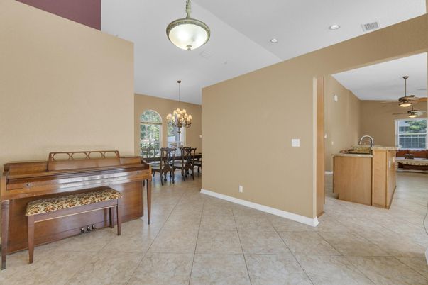 Chandelier, Dining room, Interior, Piano, Recessed Lighting