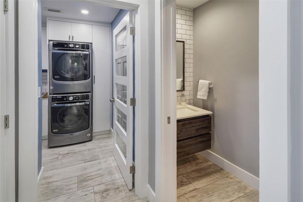 Bathroom, Interior, Recessed Lighting, Utility Closets, Washer, Wood Texture Flooring