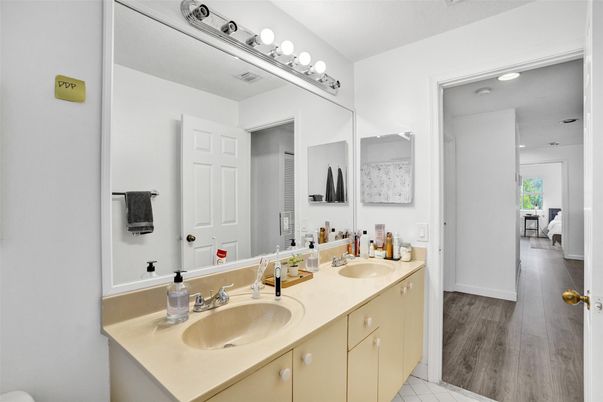 Bathroom, Dual Sink Vanities, Interior, Recessed Lighting, Wood Texture Flooring