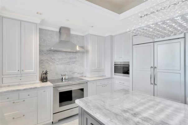 Interior, Kitchen, Marble Walls, Recessed Lighting, Stainless Steel Appliances