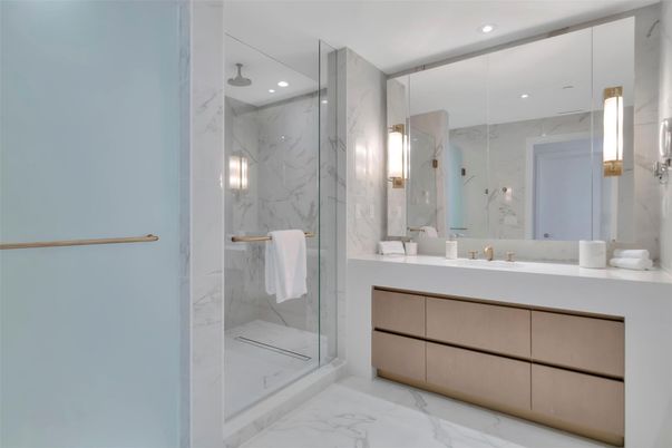 Bathroom, Dual Sink Vanities, Glass Shower, Interior, Marble, Marble Walls, Recessed Lighting