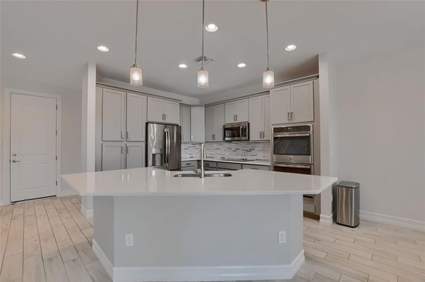 Interior, Kitchen, Pendant Lights, Recessed Lighting, Stainless Steel Appliances, Wood Texture Flooring