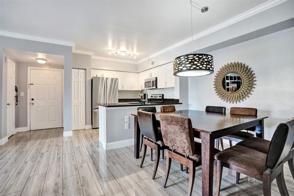 Dining room, Interior, Kitchen, Pendant Lights, Stainless Steel Appliances, Wood Texture Flooring