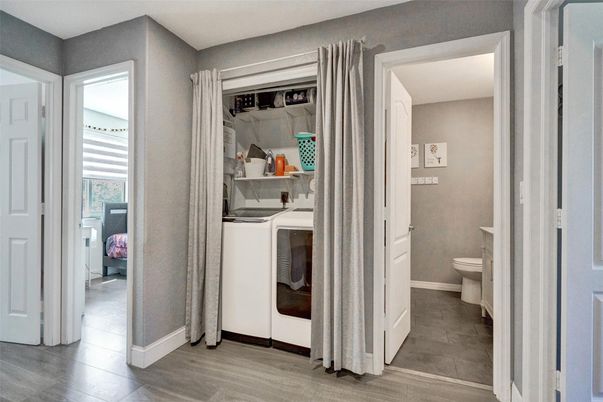 Bathroom, Interior, Utility Closets, Washer, Wood Texture Flooring