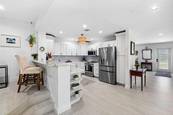 Interior, Kitchen, Recessed Lighting, Stainless Steel Appliances, Wood Texture Flooring