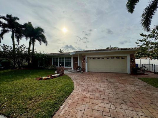 Attached, Backyard, Exterior, Facade, Brick Facade, Mediterranean
