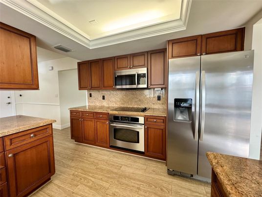 Interior, Kitchen, Recessed Lighting, Stainless Steel Appliances, Wood Texture Flooring