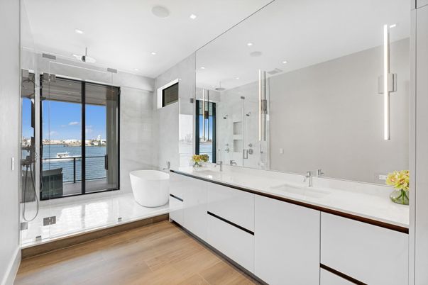 Bathroom, Dual Sink Vanities, Free Standing Baths, Glass Shower, Interior, Recessed Lighting, Water, Wood Texture Flooring