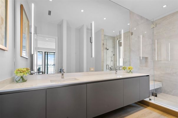 Bathroom, Dual Sink Vanities, Glass Shower, Interior, Recessed Lighting, Wood Texture Flooring